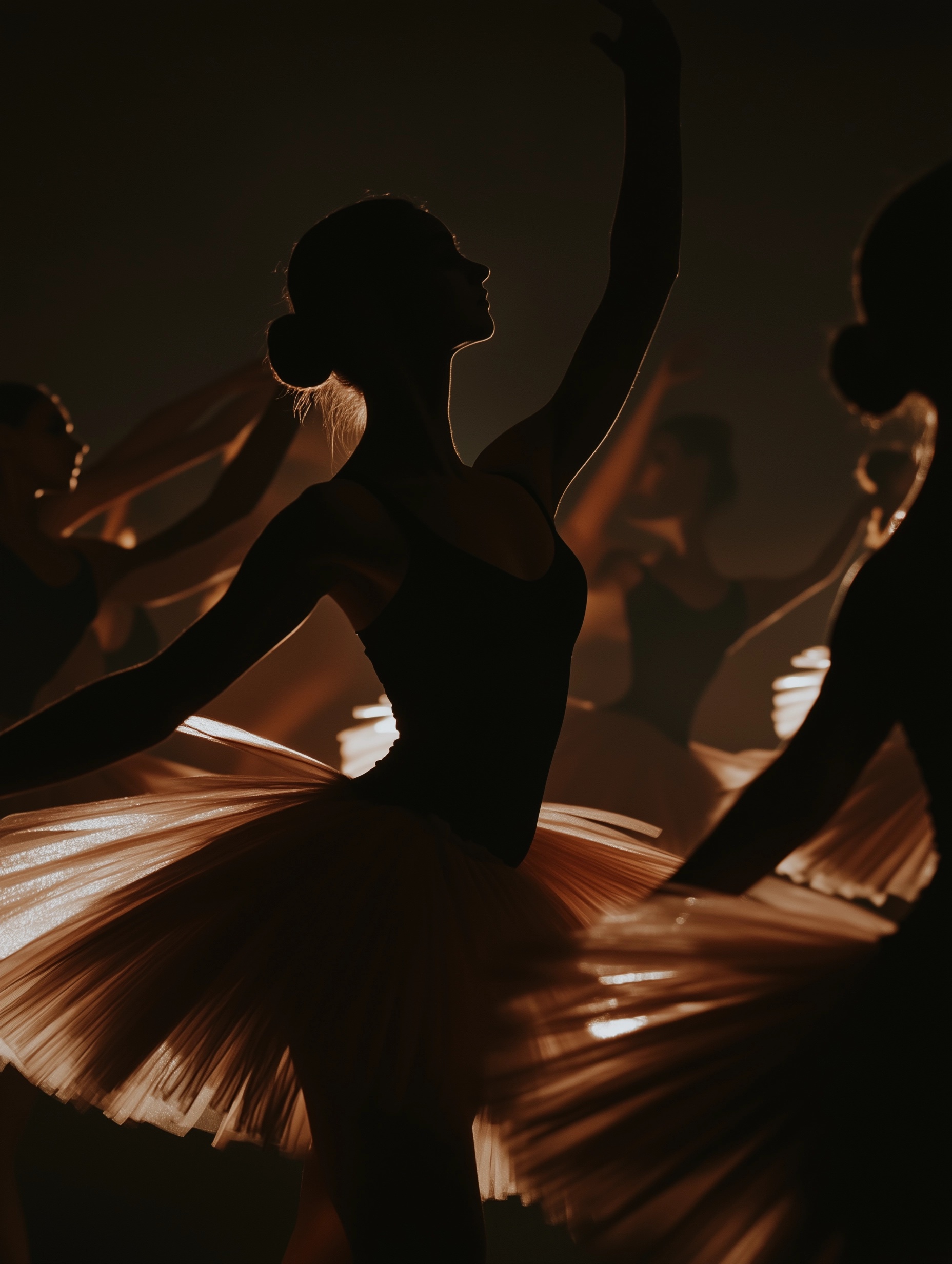 Elegant Ballerina Silhouette in Dramatic Lighting