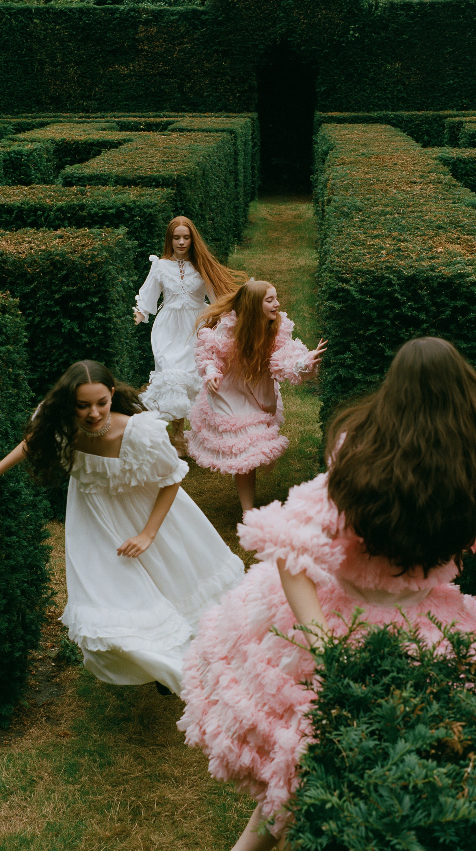 Elegant Play: Women in White and Pink Dresses