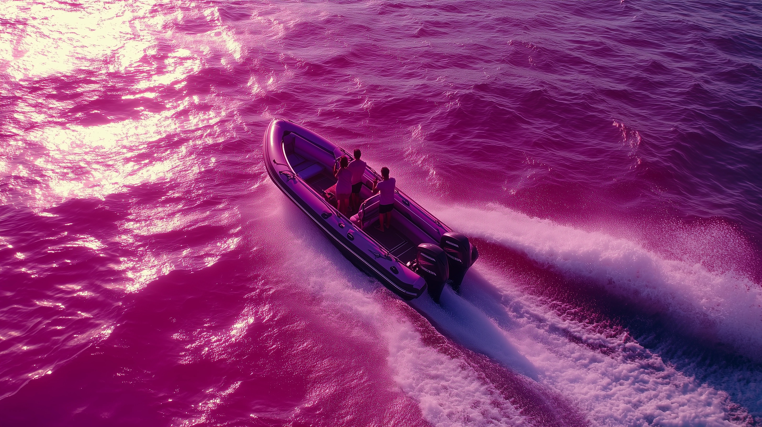 Thrilling Zodiac Adventure on Pink Ocean Waves