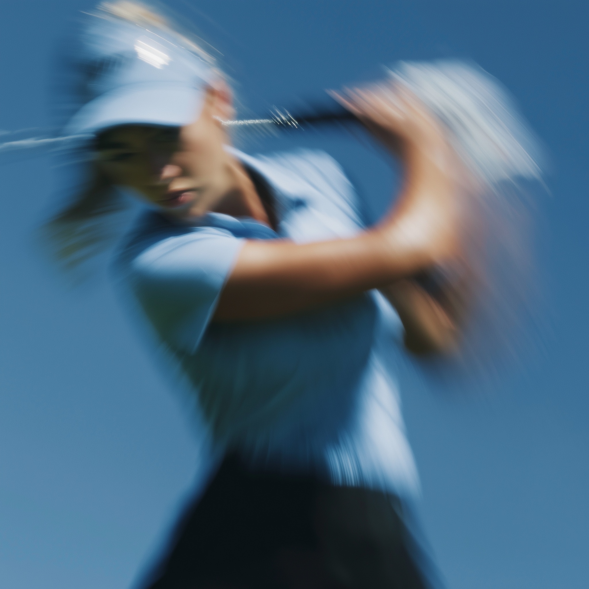 Dynamic Female Golfers in Orange Polos