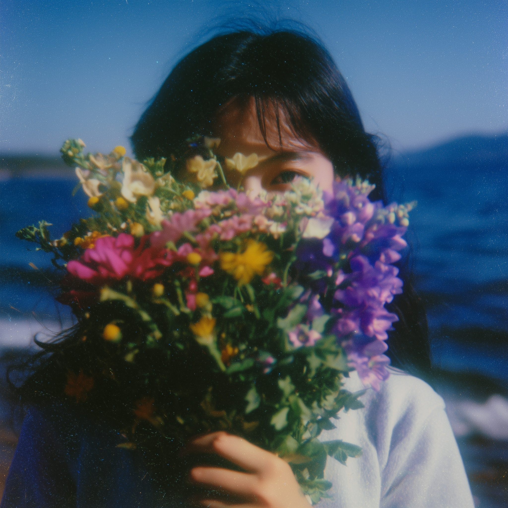 Sunny Beach Portrait: Korean Girl with Wild Flowers